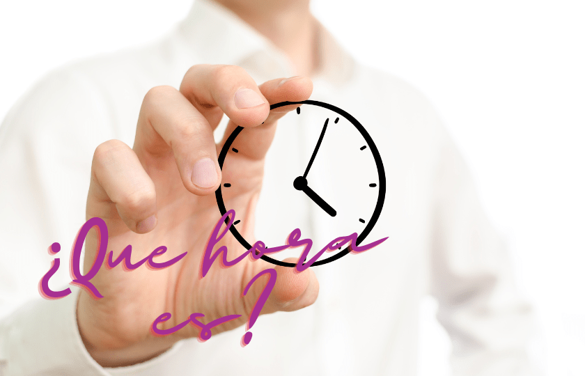 An image of a man holding a well-designed clock, representing how to ask about time in the Spanish language.