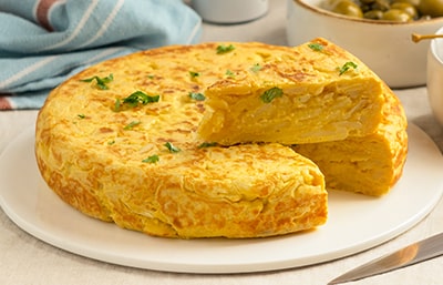 Spanish omelette made with eggs, potatoes, and onions